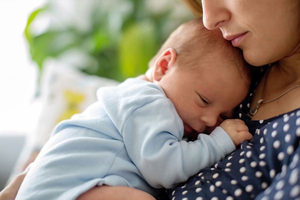 Baby on mothers chest